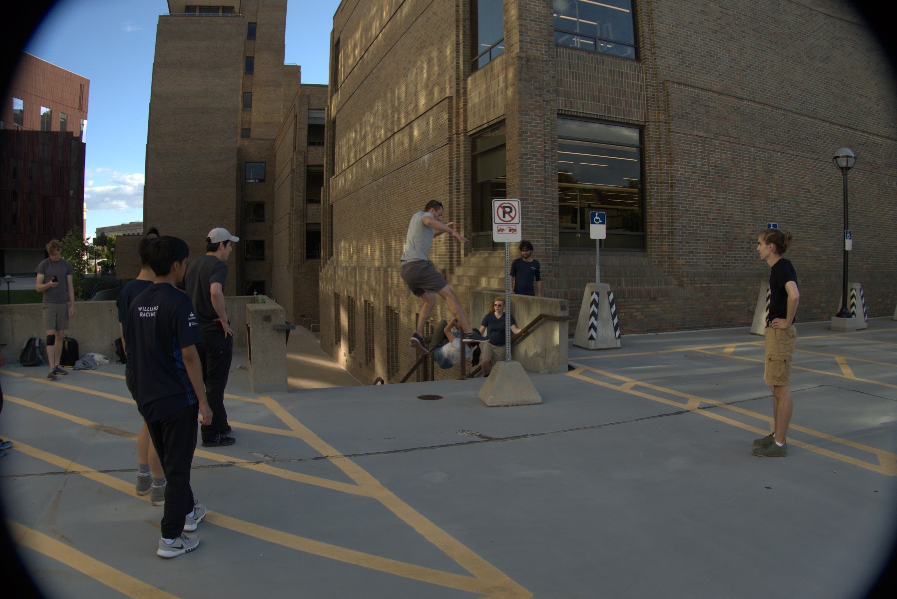 Michigan Parkour members training near campus architecture